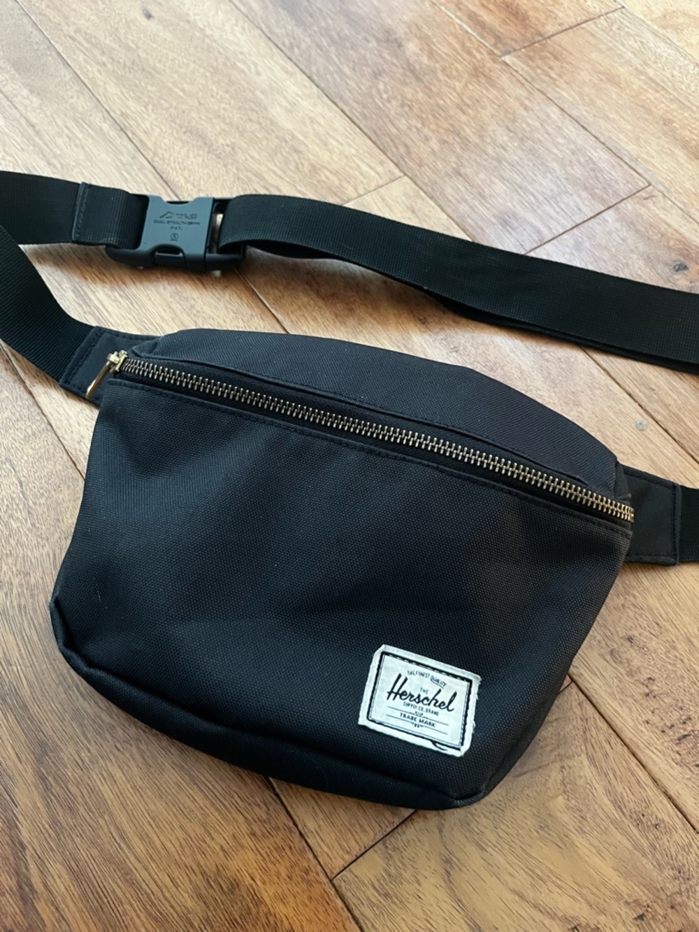 Herschel Supply Co. Fifteen Hip Pack Black with Gold Zipper & Red/White Stripes